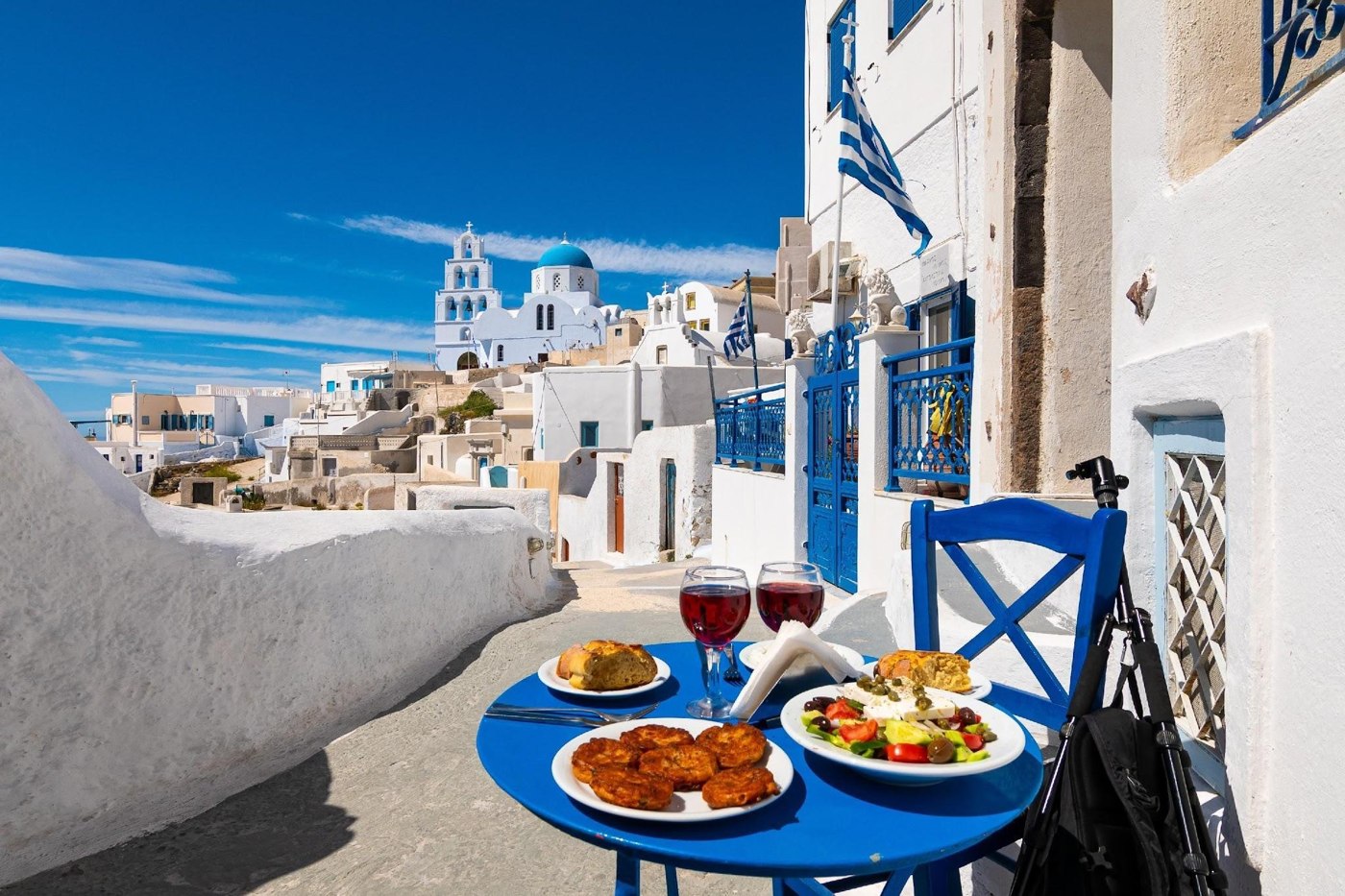 A sunlit terrace overlooking the Aegean Sea